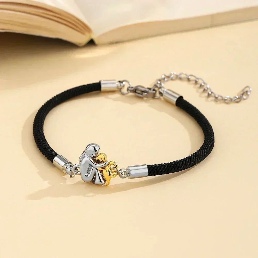 El Abrazo Eterno - Pulsera con Dije